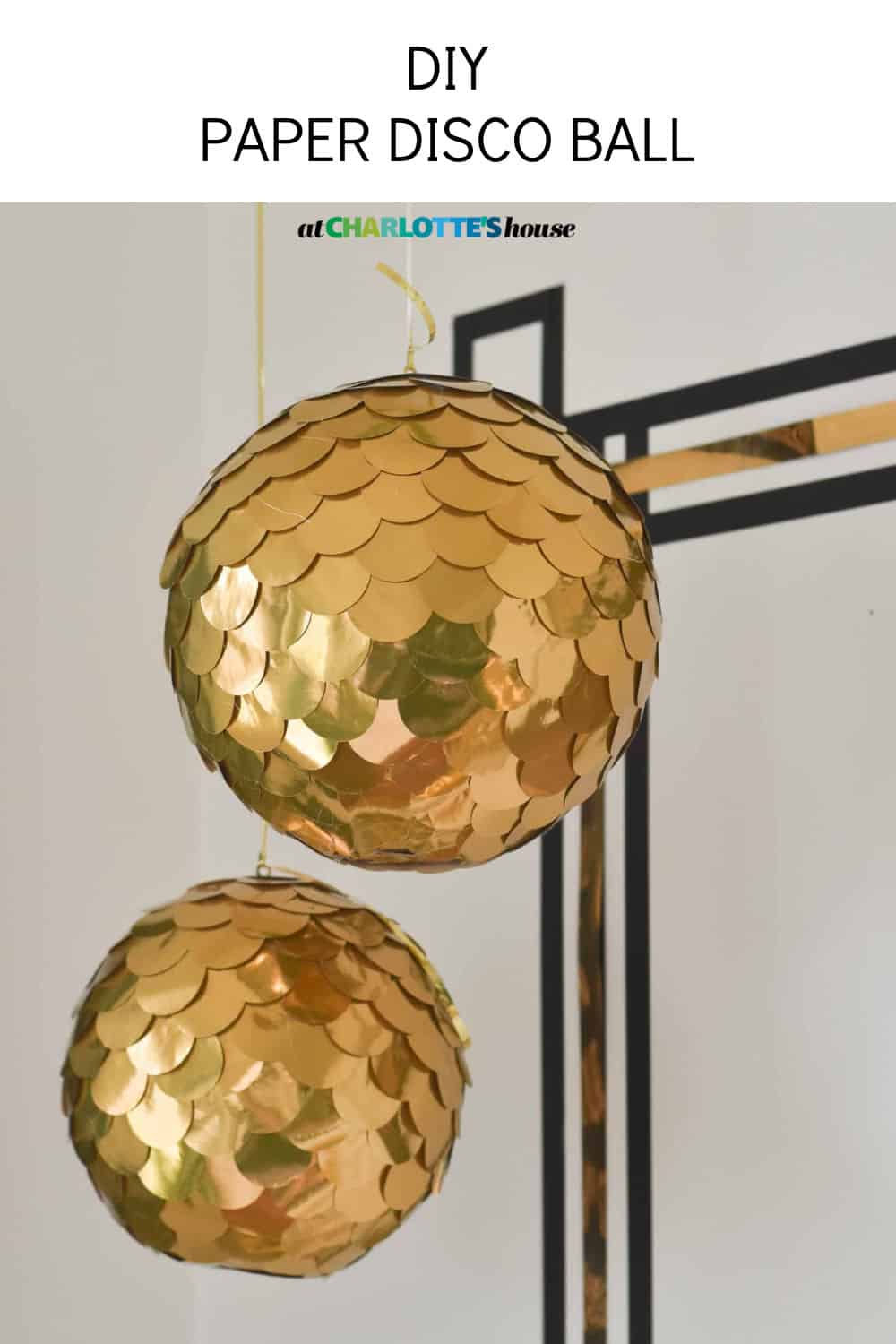 Gold Paper Disco Balls | DIY Party Decorations Idea Two hanging paper disco balls covered in overlapping gold paper circles with DIY Paper Disco Ball text