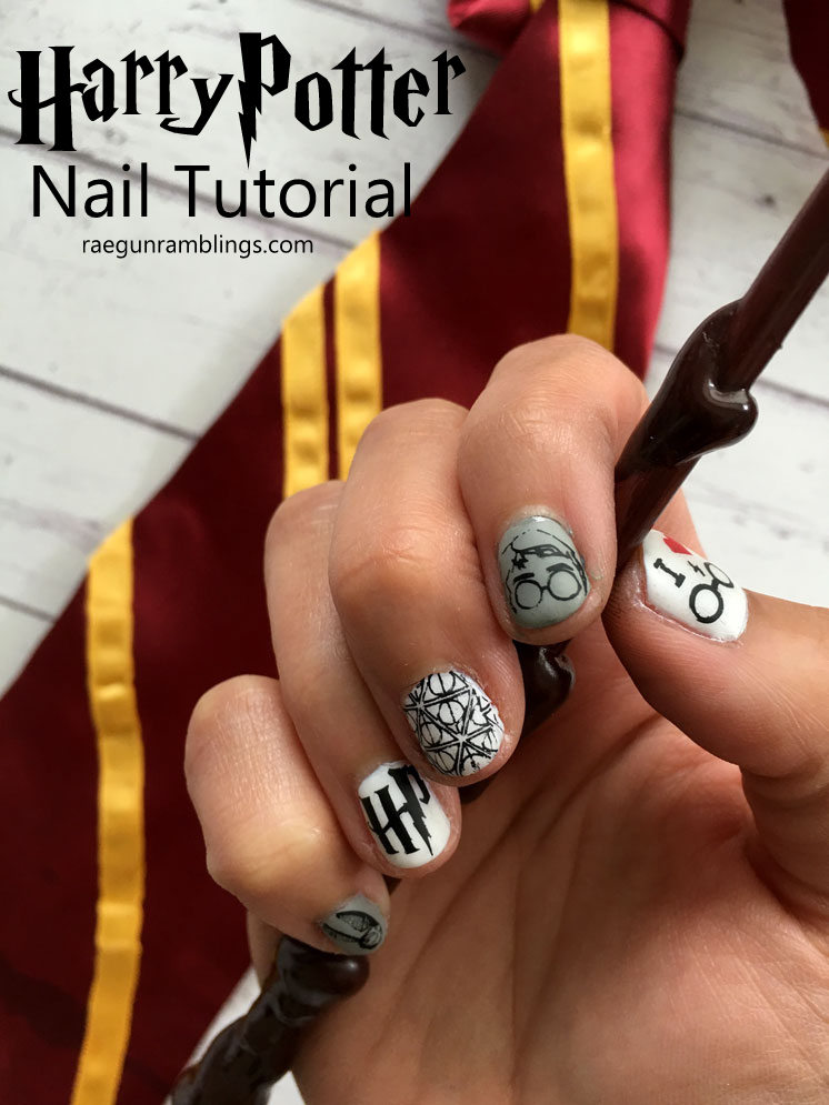 Harry Potter Stamped Nails | Quick Nail Art Idea Harry Potter stamped nails with glasses, Deathly Hallows and HP logo on white and gray nails, hand holding a wand by a tie