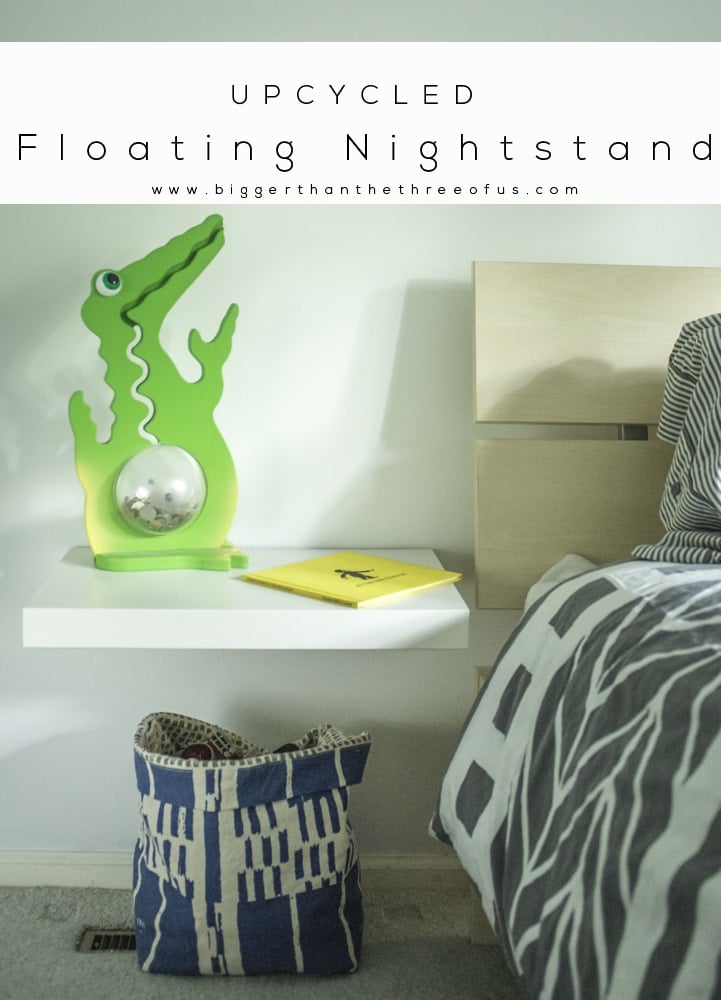 IKEA LACK Floating Nightstand | IKEA Bedroom Hack White floating nightstand shelf cut from an IKEA LACK table beside a bed, with a green toy on top and a basket below