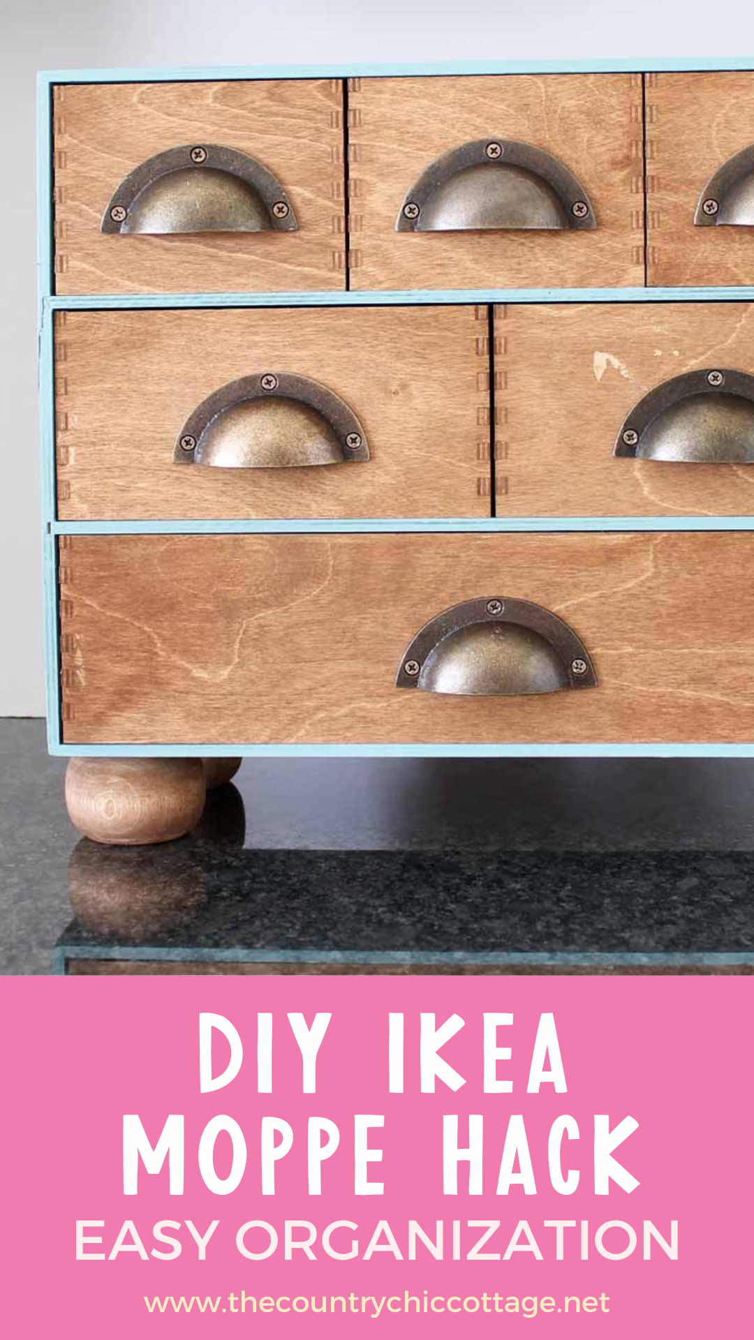 Pin graphic of an IKEA Moppe mini chest with a blue painted frame, walnut stained drawers, brass cup pulls and bun feet