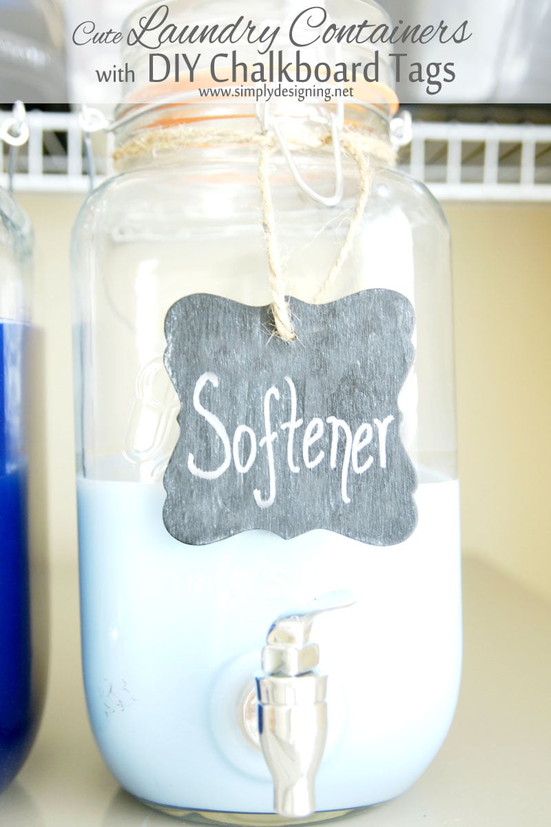 Glass drink dispenser of blue fabric softener with a painted chalkboard Softener tag tied on with jute twine