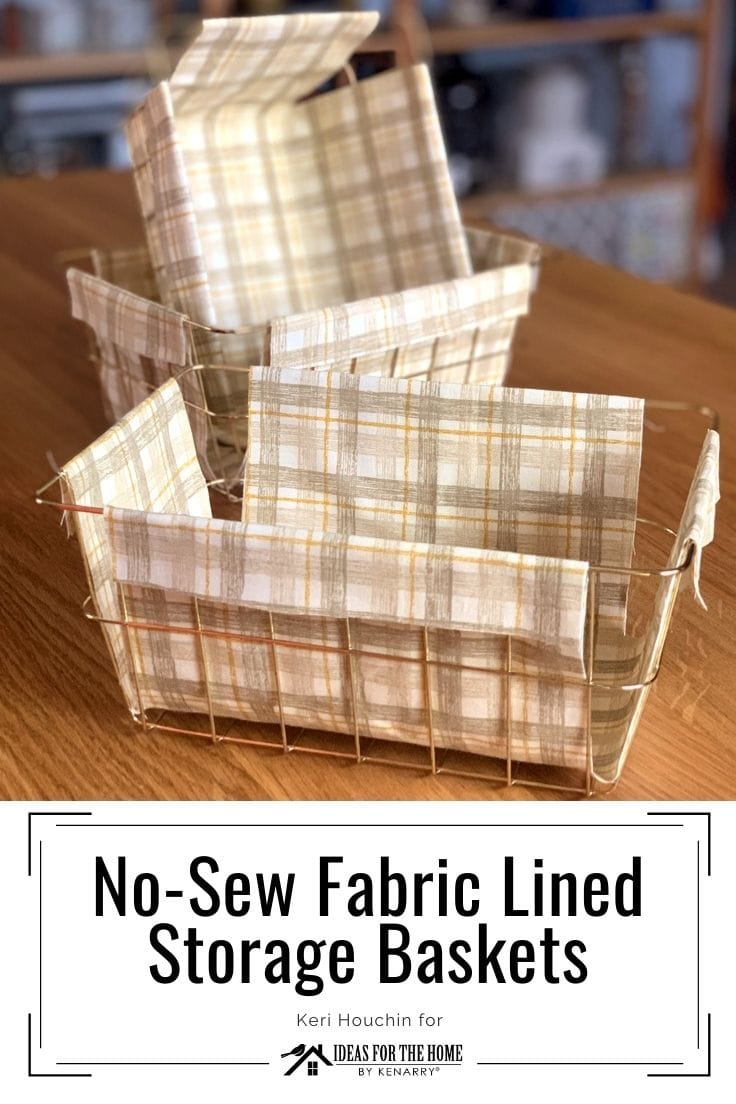 Three wire baskets lined with cream and tan plaid fabric on a wood table, with a No-Sew Fabric Lined Storage Baskets title