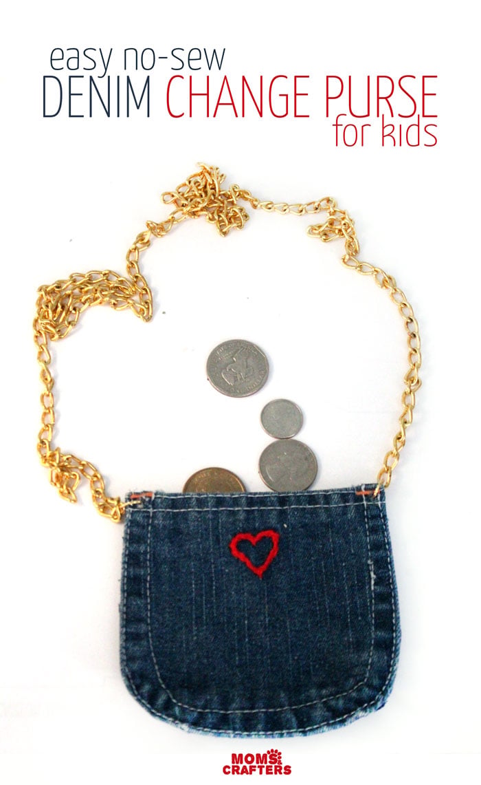 Small dark denim jeans pocket purse with a red embroidered heart and gold chain strap, coins spilling from the top
