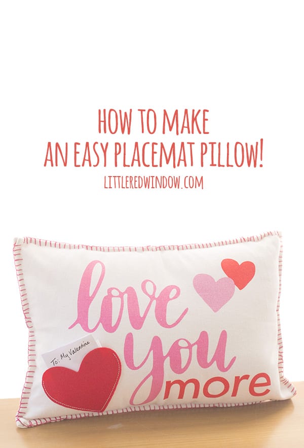No-Sew Placemat Pillow | Home Sewing Project White placemat pillow with pink love you more lettering, red and pink hearts and a small heart pocket holding a note