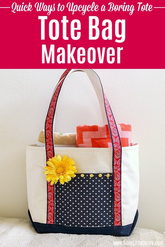 Canvas tote with navy bottom, red patterned ribbon handles, a polka dot pocket and a yellow flower, holding orange towels