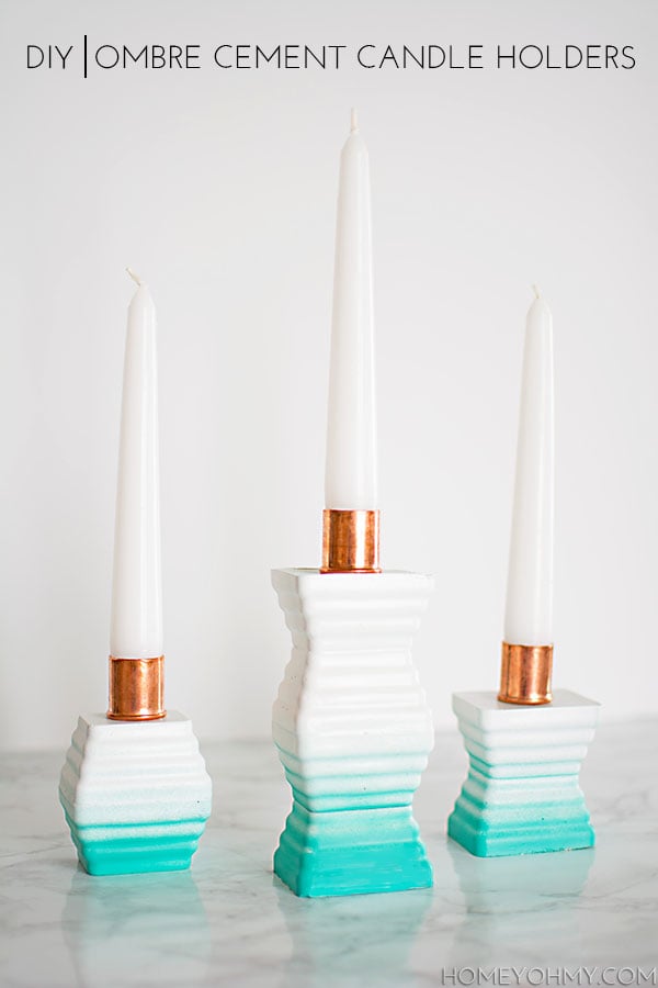 Ombre Cement Candle Holders | Ice Tray Mold DIY Three white and turquoise ombre cement taper candle holders with copper cups and white candles on white marble