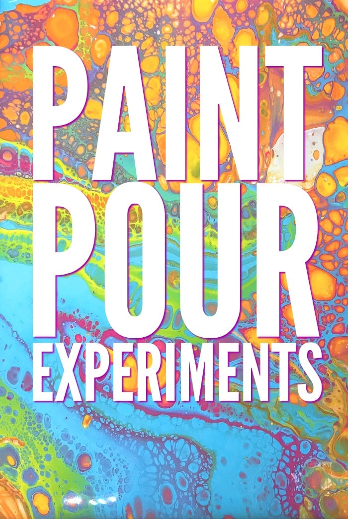 Paint Pour Art on Tiles | Fluid Art Craft Paint pour art on tiles, a close up of bright turquoise, orange, yellow and purple cells and swirls on a glazed surface