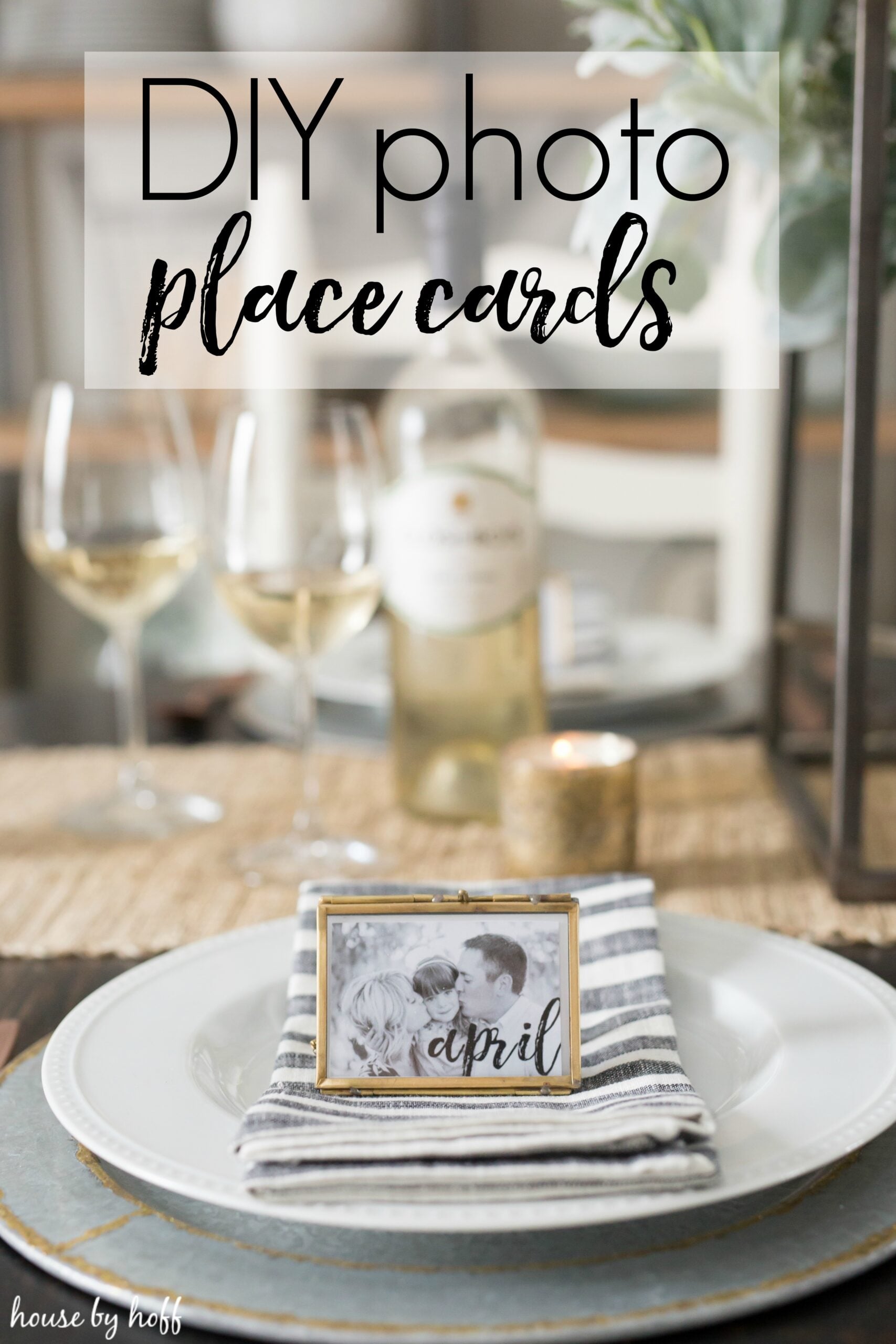 Photo Place Cards | DIY Party Decorations Idea Gold frame place card holding a black and white couple photo with the name April, set on a striped napkin on a white plate