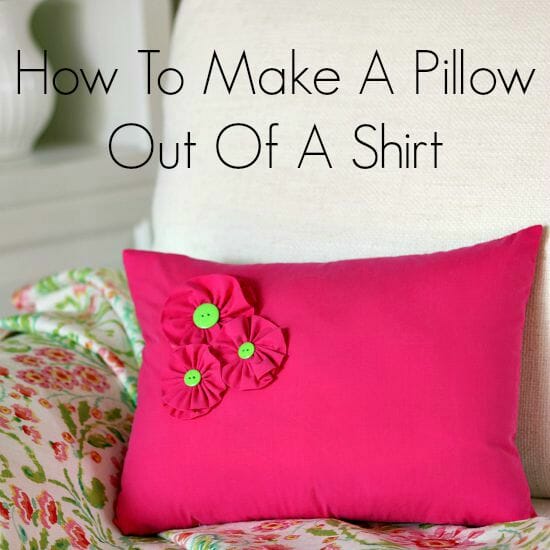 Pillow Made From a Shirt | Home Sewing Project Hot pink pillow sewn from a button down shirt with three fabric yo-yo flowers and green button centers on a floral throw