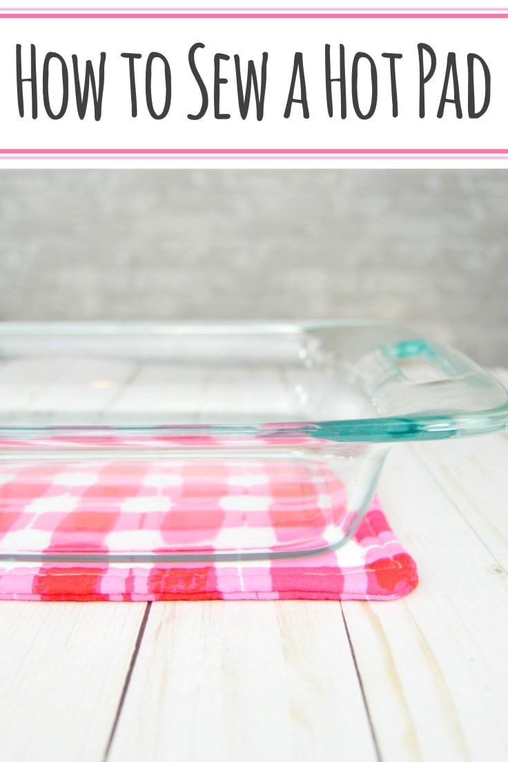 Glass baking dish resting on a pink and red plaid quilted hot pad on white wood planks under How to Sew a Hot Pad text