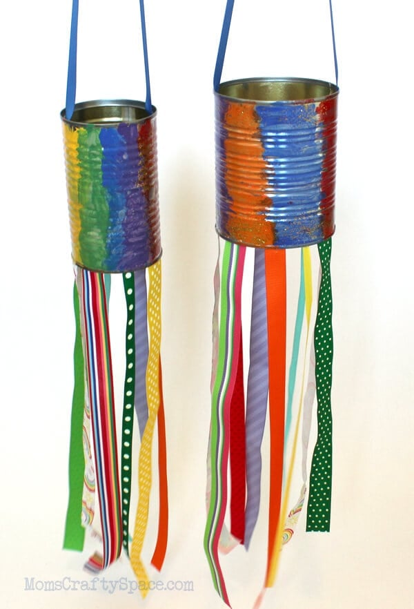 Tin Can Windsock | Tin Can Idea Two tin can windsocks painted in rainbow stripes with long colorful ribbon streamers hanging below