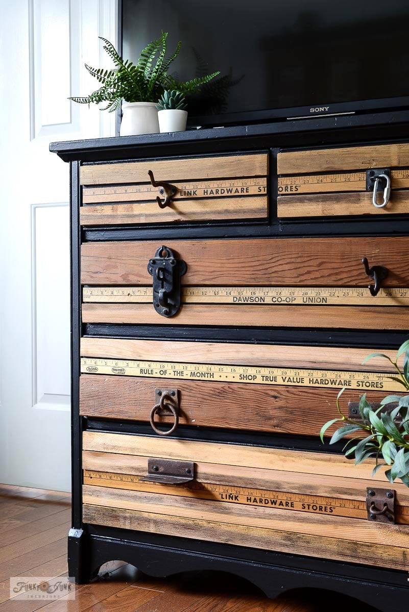 Yardstick Drawer TV Stand Dresser | DIY Media Room Idea Black dresser TV stand with drawer fronts covered in vintage yardsticks and cedar strips and rusty hardware pulls